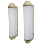 Art Deco brass wall sconce with milk glass shade