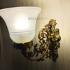 Pair of antique brass Victorian wall sconces with frosted glass shades