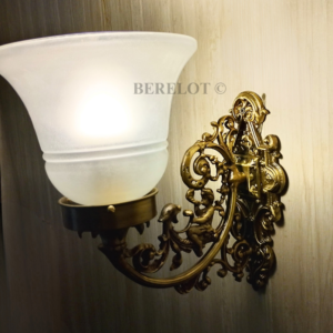 Pair of antique brass Victorian wall sconces with frosted glass shades
