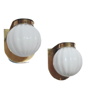 Pair of Art Deco brass wall sconces with ribbed milk glass