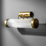 Art Deco horizontal brass and clear glass wall sconce