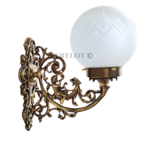 Pair of Victorian brass wall sconces with etched frosted glass globes