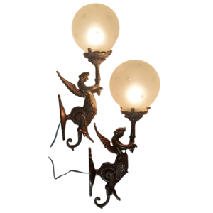Pair of antique reproduction mermaid brass wall sconces with frosted glass globes
