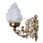 Pair of antique reproduction Victorian brass sconces with frosted flame glass