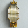 Art Deco tiered clear glass rod wall sconce in brass