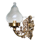 Pair of Victorian-style brass wall sconces with cut clear glass shades