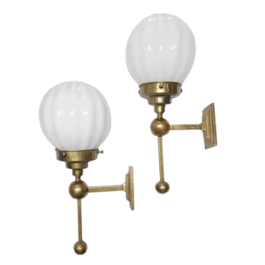 Pair of Art Deco brass globe wall sconces with milk glass