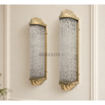 Pair of Art Deco brass wall sconces with ribbed clear glass rods