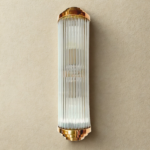 Art Deco brass cylinder wall sconce with fluted clear glass rods
