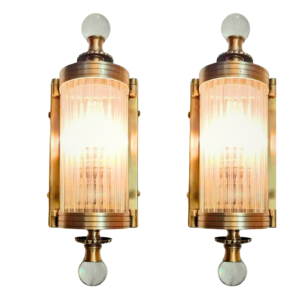 Pair of Art Deco brass wall sconces with clear glass and ball finials